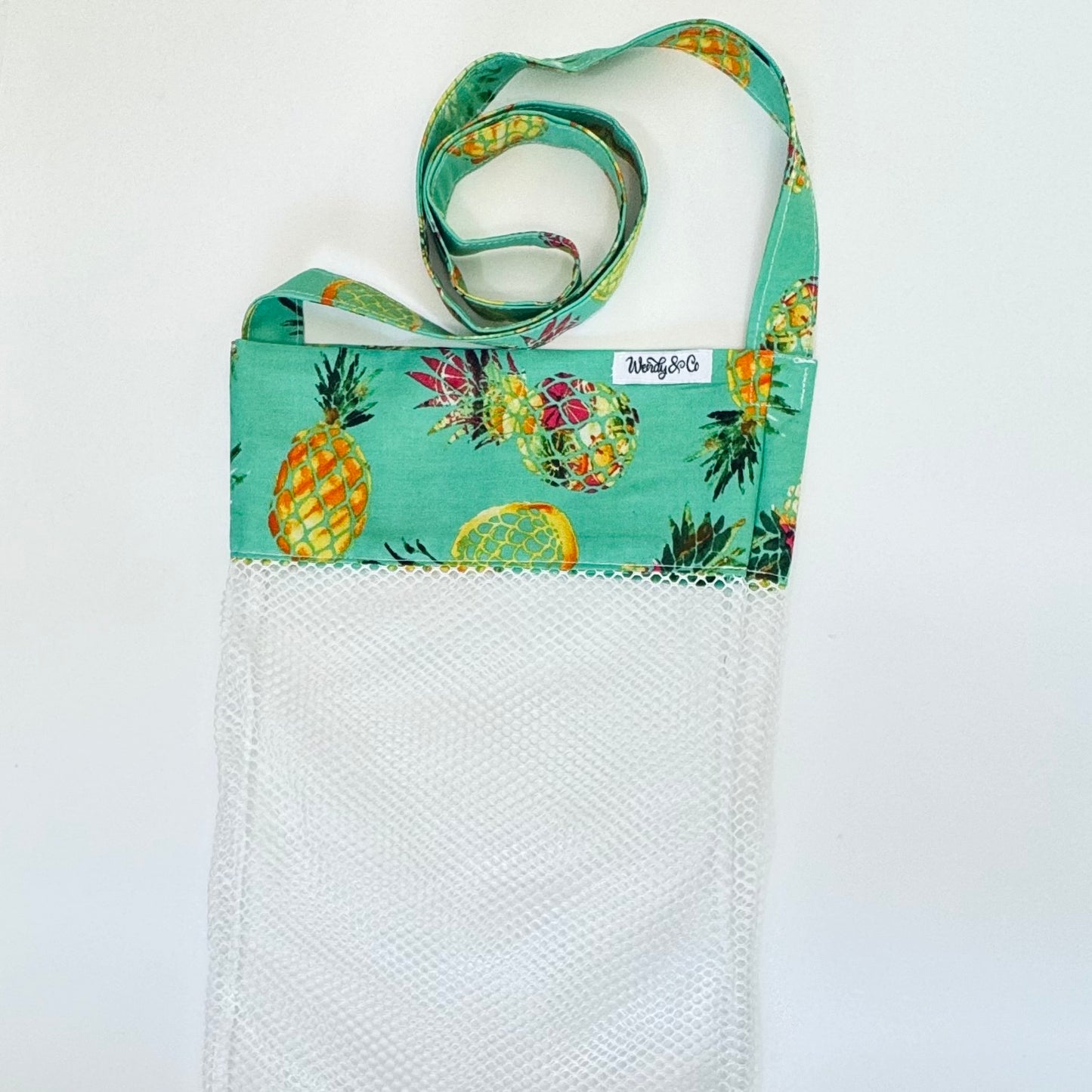 Crossbody seashell bag and bright happy colors.