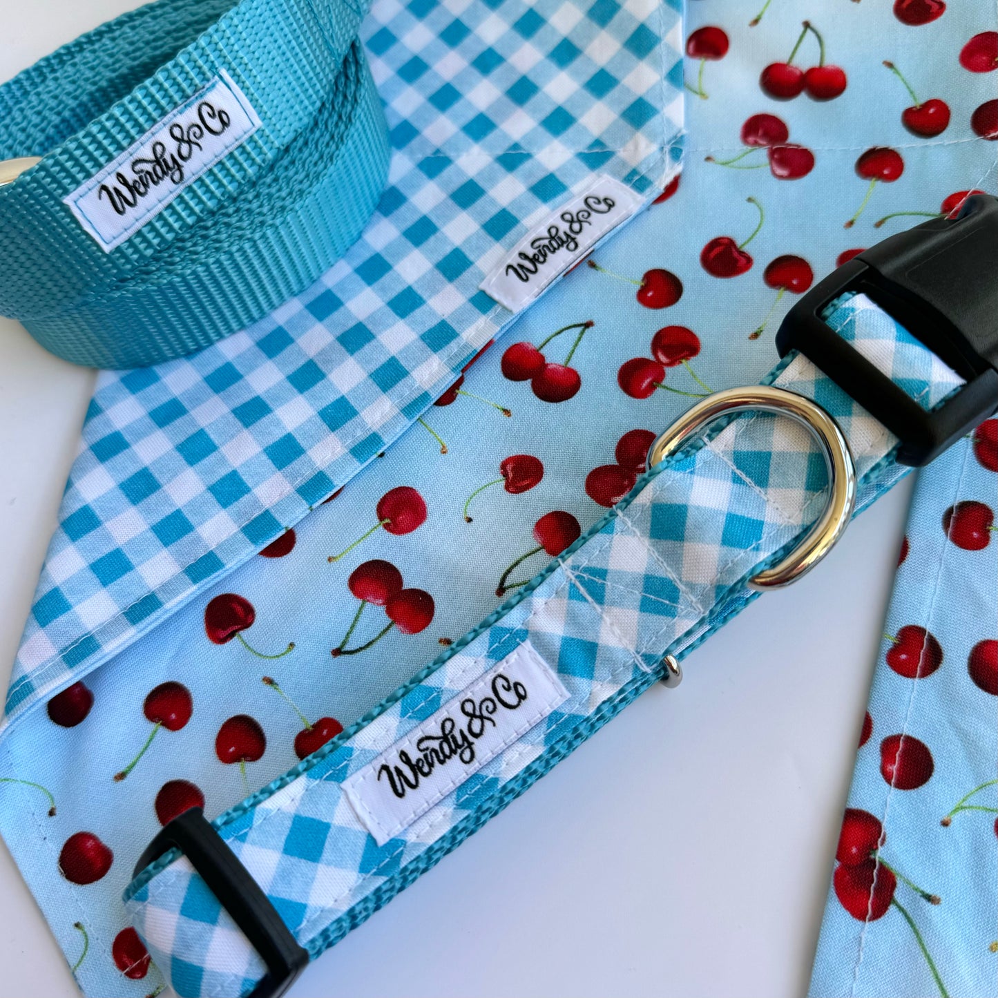 Handmade dog bandana that slides over the collar, shown with matching collar and leash.