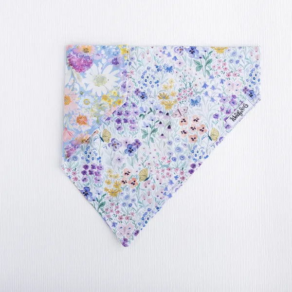 Butterfly Garden dog bandana showing reversible sides- lilac floral.