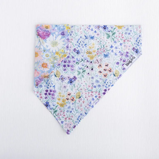 Butterfly Garden dog bandana showing reversible sides- lilac floral.