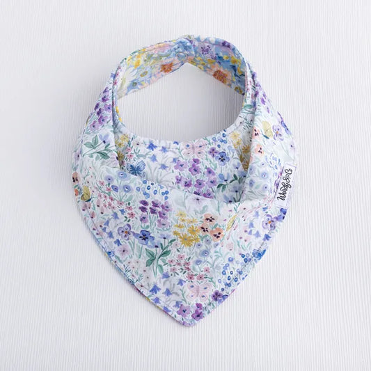 Handmade baby bib in Butterfly Garden floral fabric – lilac and spring colors