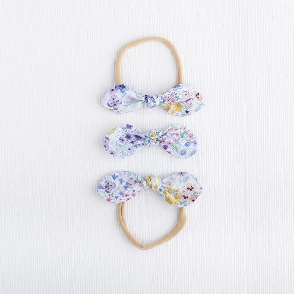Handmade floral hair bow in Butterfly Garden print.