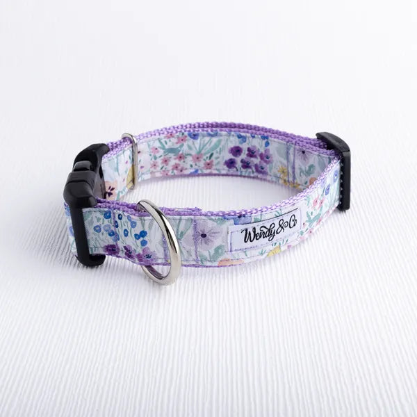 Waterproof handmade dog collar in lilac butterfly garden print.