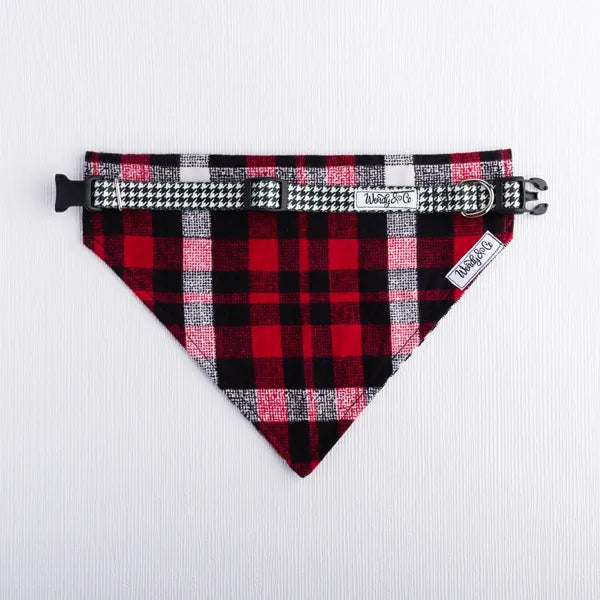 Waterproof dog collar and reversible bandana that slides over the collar in black and white check.