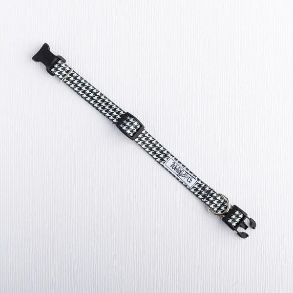 Waterproof dog collar in classic black and white check.