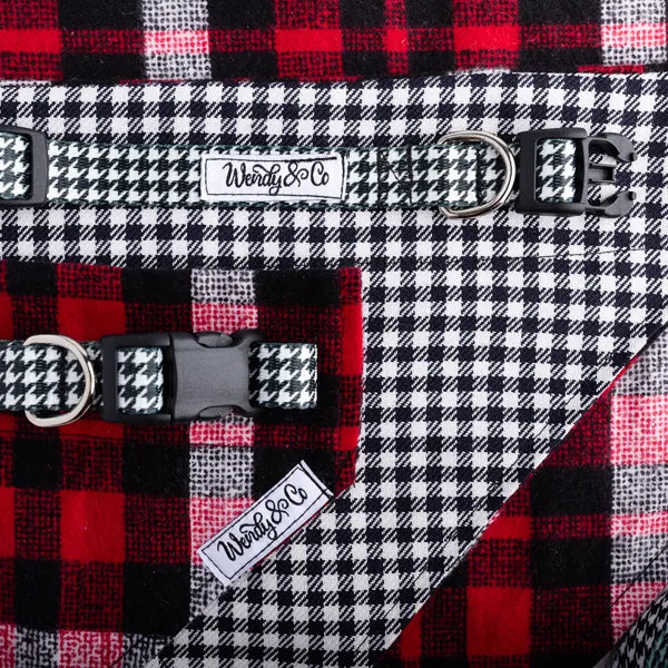 Close up of Winter Plaid red dog bandana and black and white check.