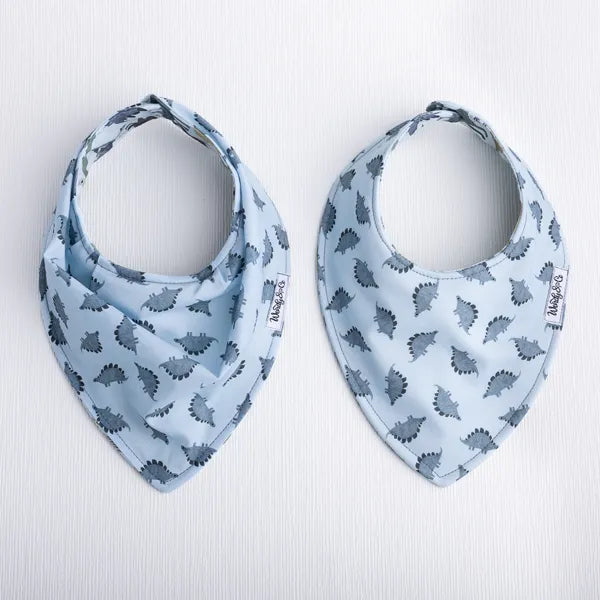 Reversible Dinosaur Dream baby bib with triceratops and other dinos.