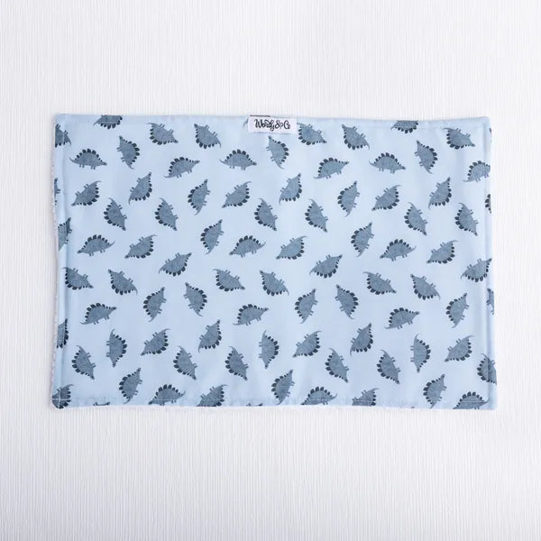 Handmade burp cloth featuring stegosaurus on blue background