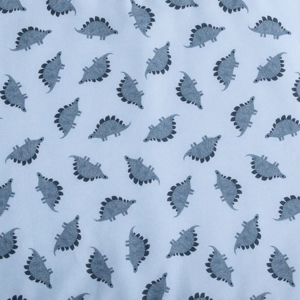 Close up of blue dinosaur fabric from the Dinosaur Dream collection