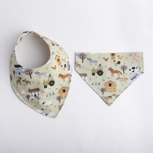 Gender neutral dog and baby matching bib and bandana in farm print.