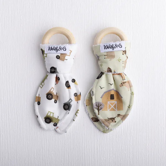 Organic teethers in homestead and tractor print.