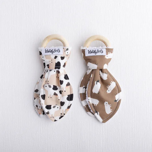 Organic teether for baby in sheep and cow fabric.
