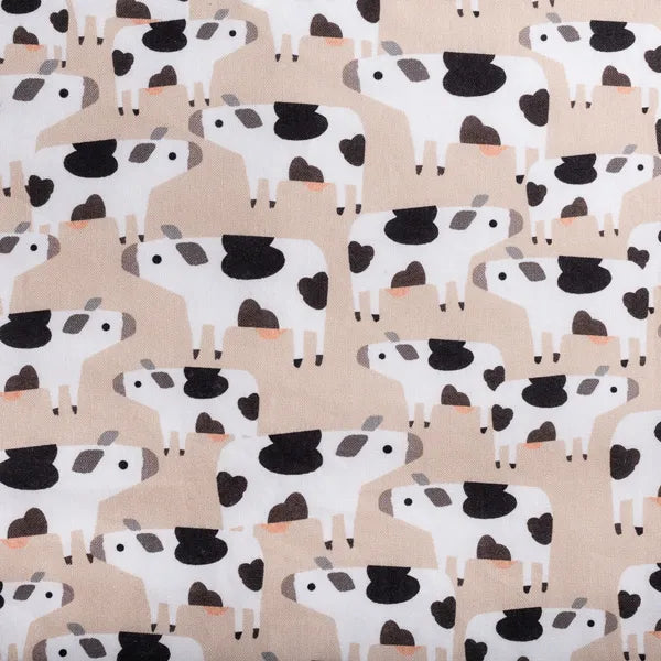 Close up of Legend-Dairy fabric- cows.
