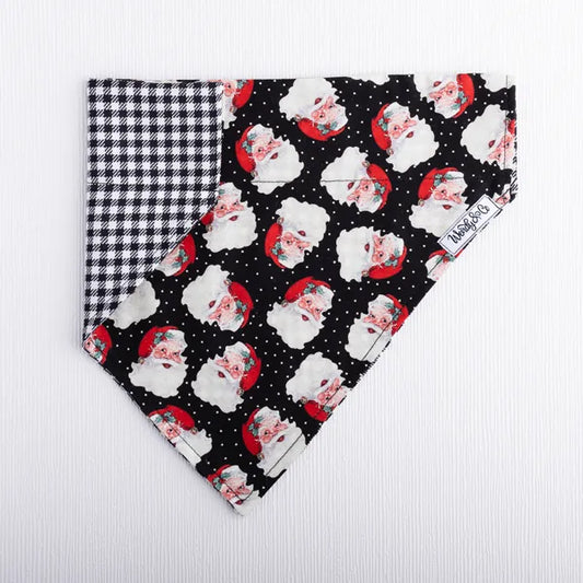 Dog bandana featuring Christmas Santa print and classic houndstooth reverse.