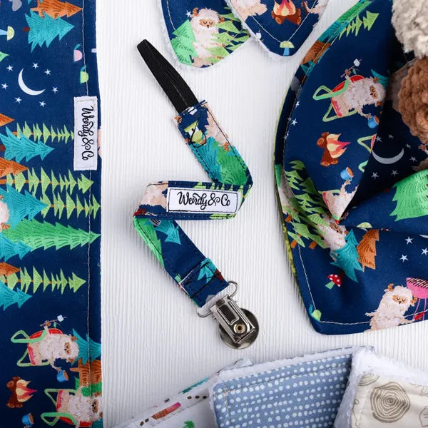 Pacifier clip with starry Sasquatch fabric from Under the Stars baby gift collection.