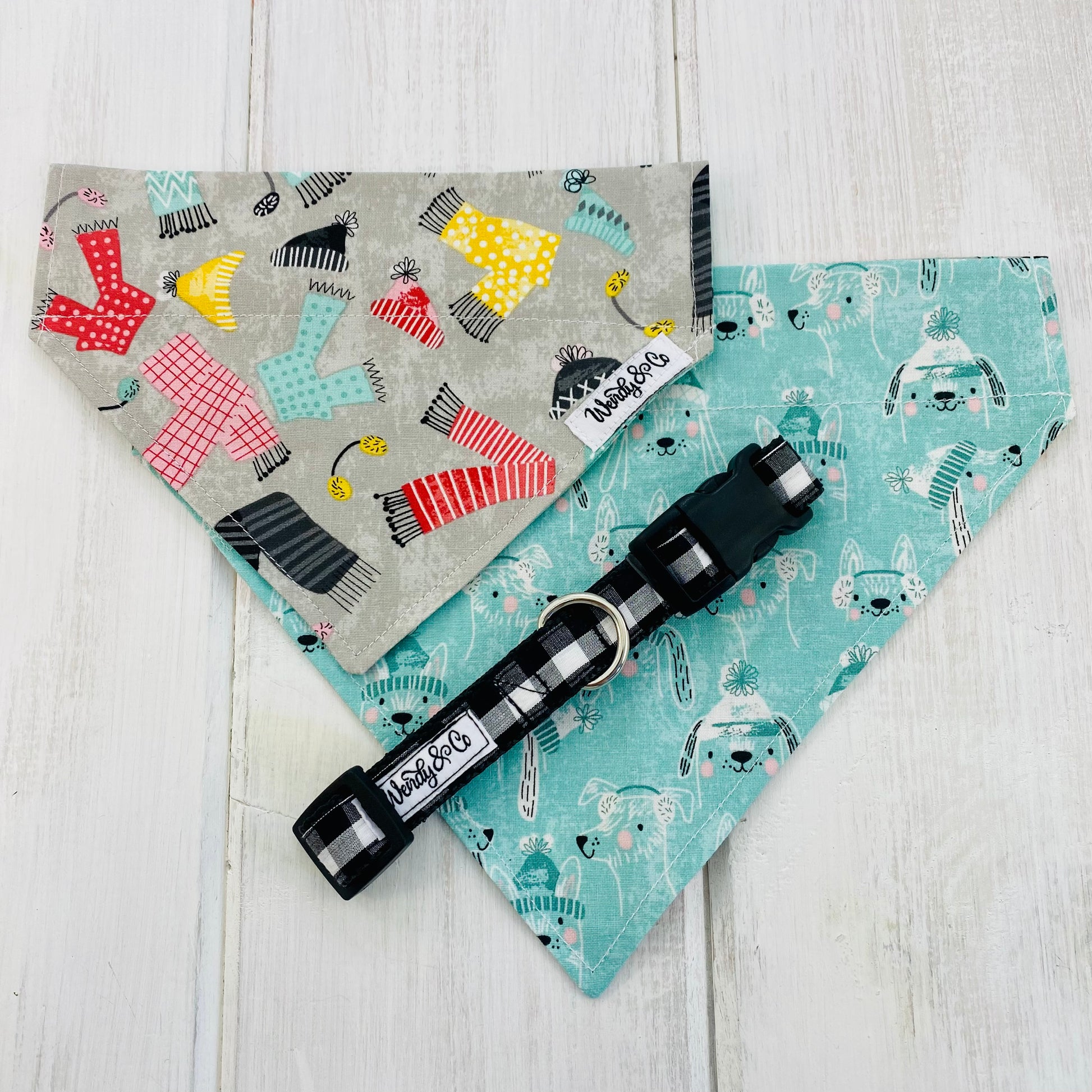 Black and white collar with winter print dog bandana.