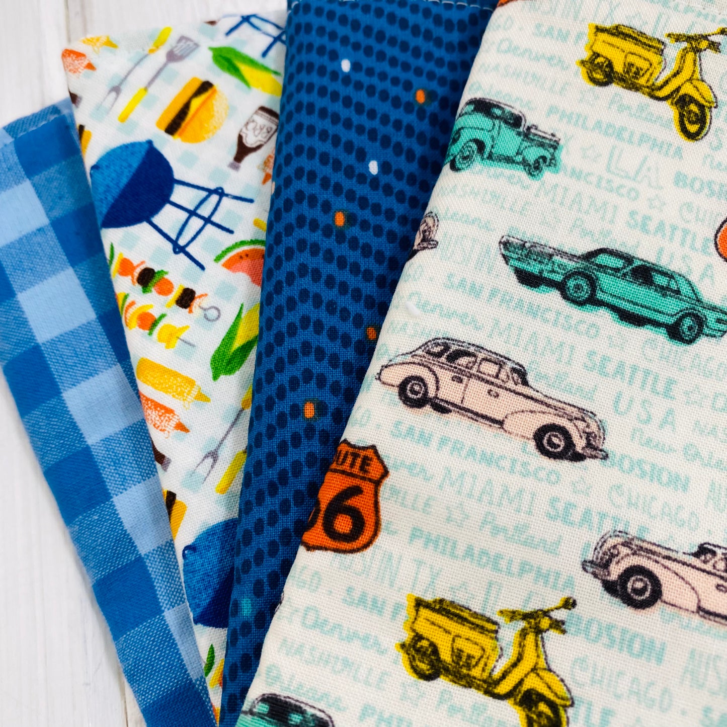 Set of 4 sustainable reusable washing cloths for boys, in Route 66 fabric and other assorted fabrics.
