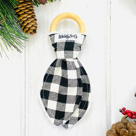 wood & fabric bunny ear teether in black and cream check.