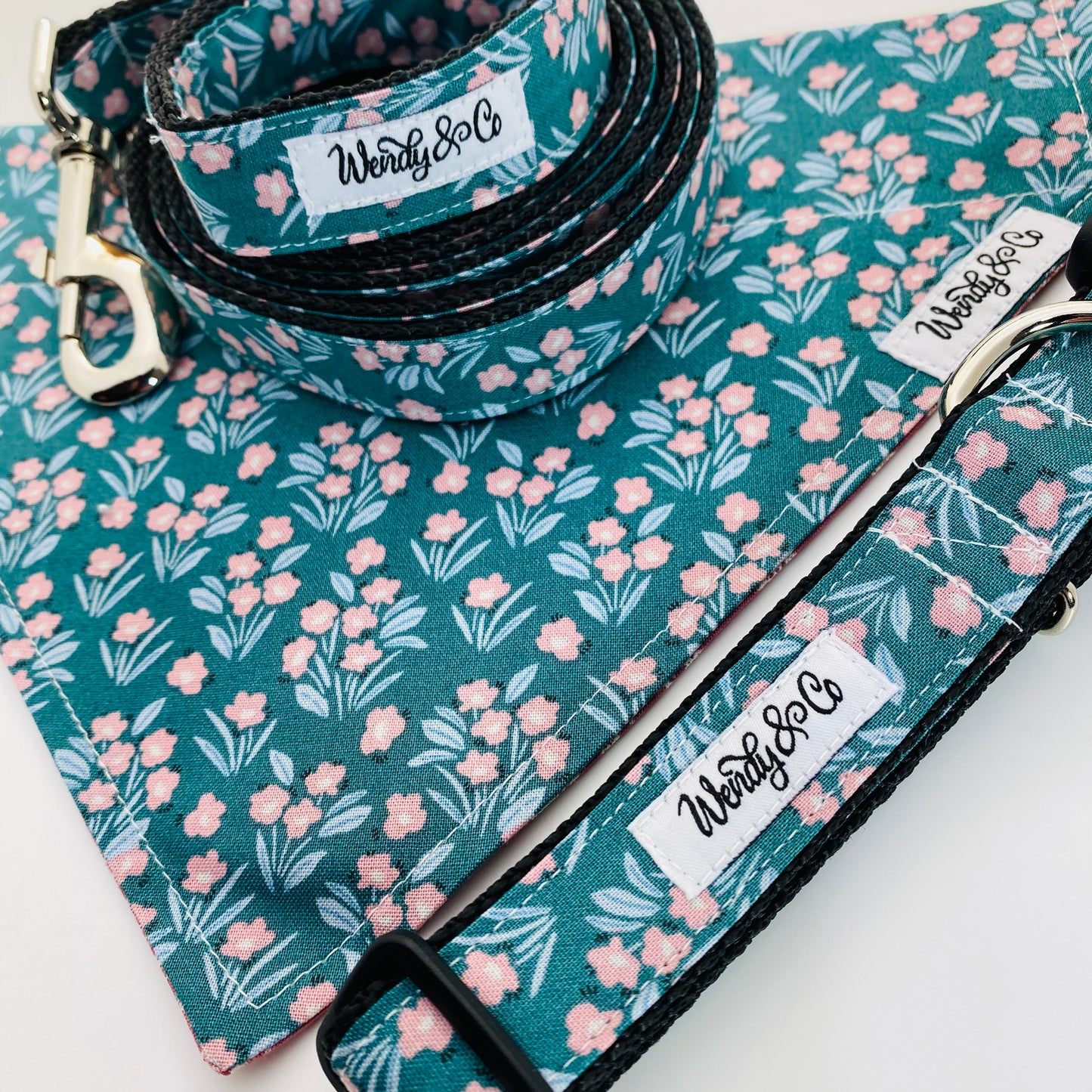 Teal and pink floral dog set with reversible bandana, collar and leash.
