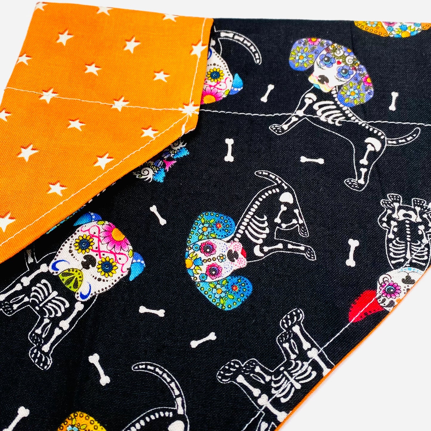 Glow in the dark dog bandana that slides over the collar.