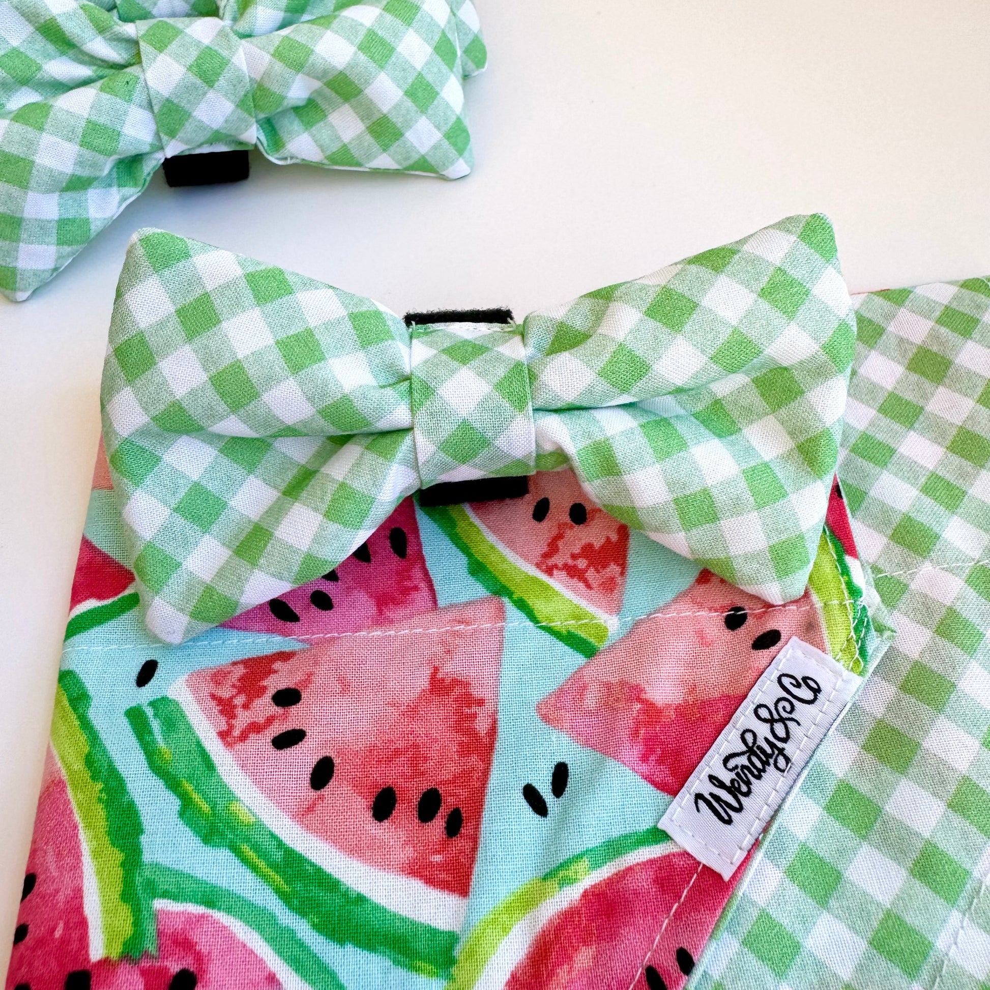 Watermelon dog bandana with green gingham bow tie.