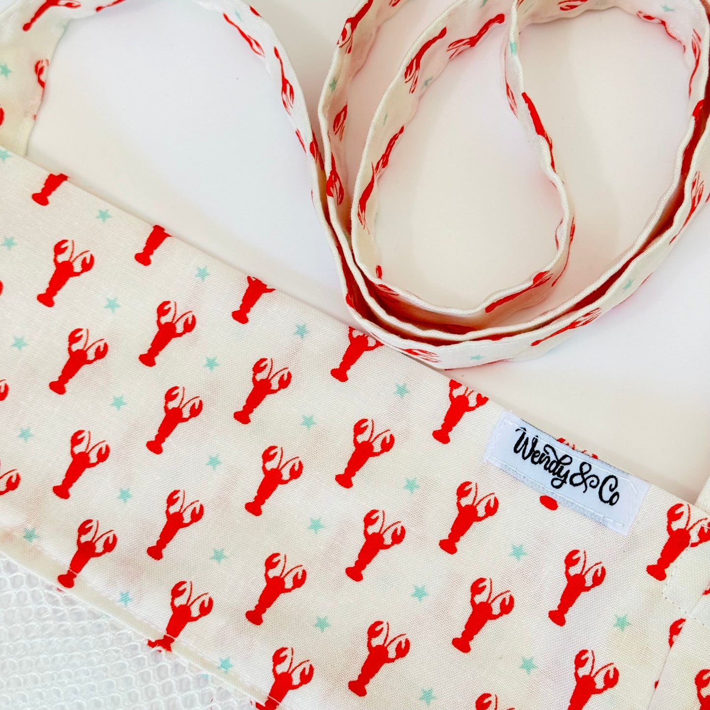 Handmade, seashell bag, white with red lobsters.