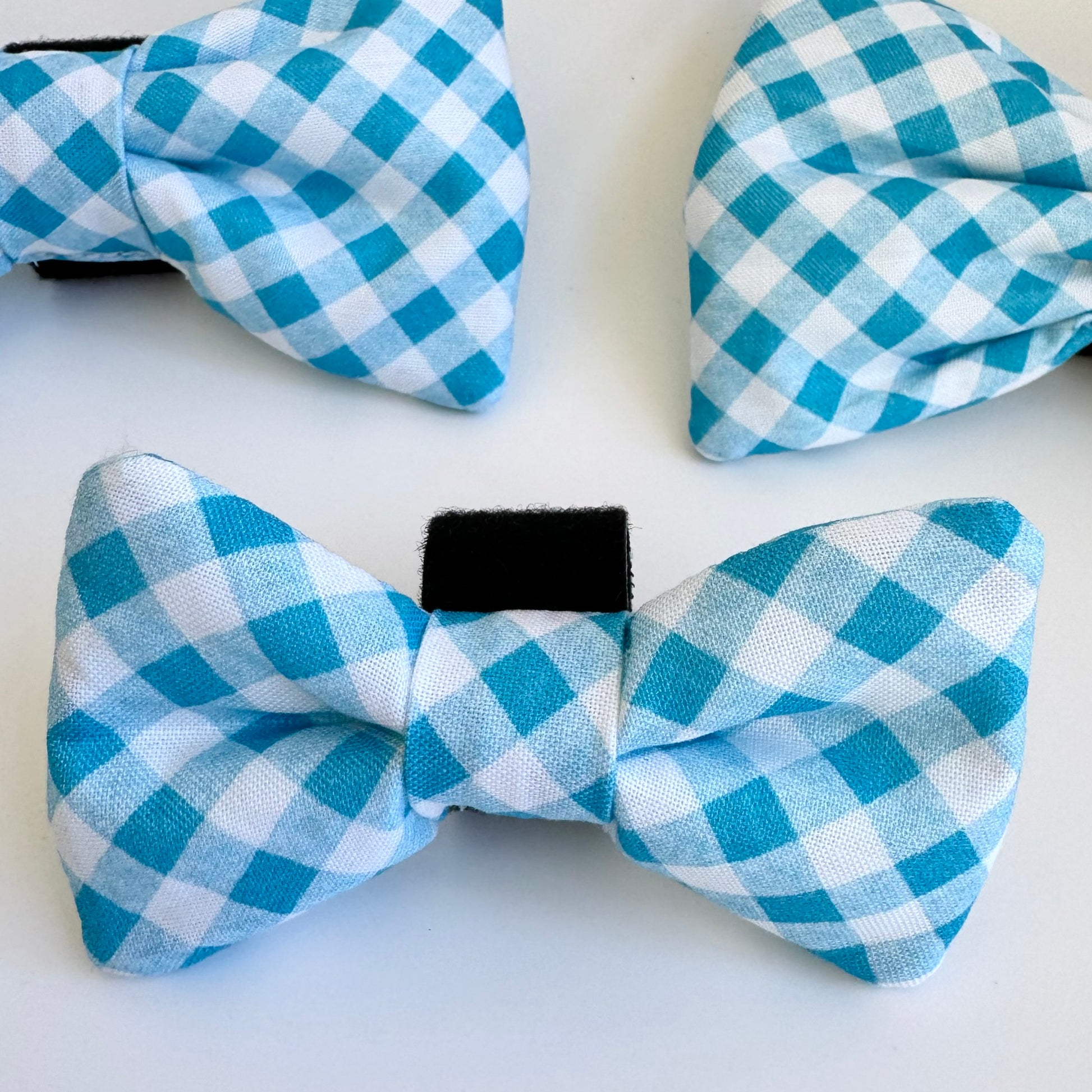 Crystal blue bow tie with Velcro attachment.