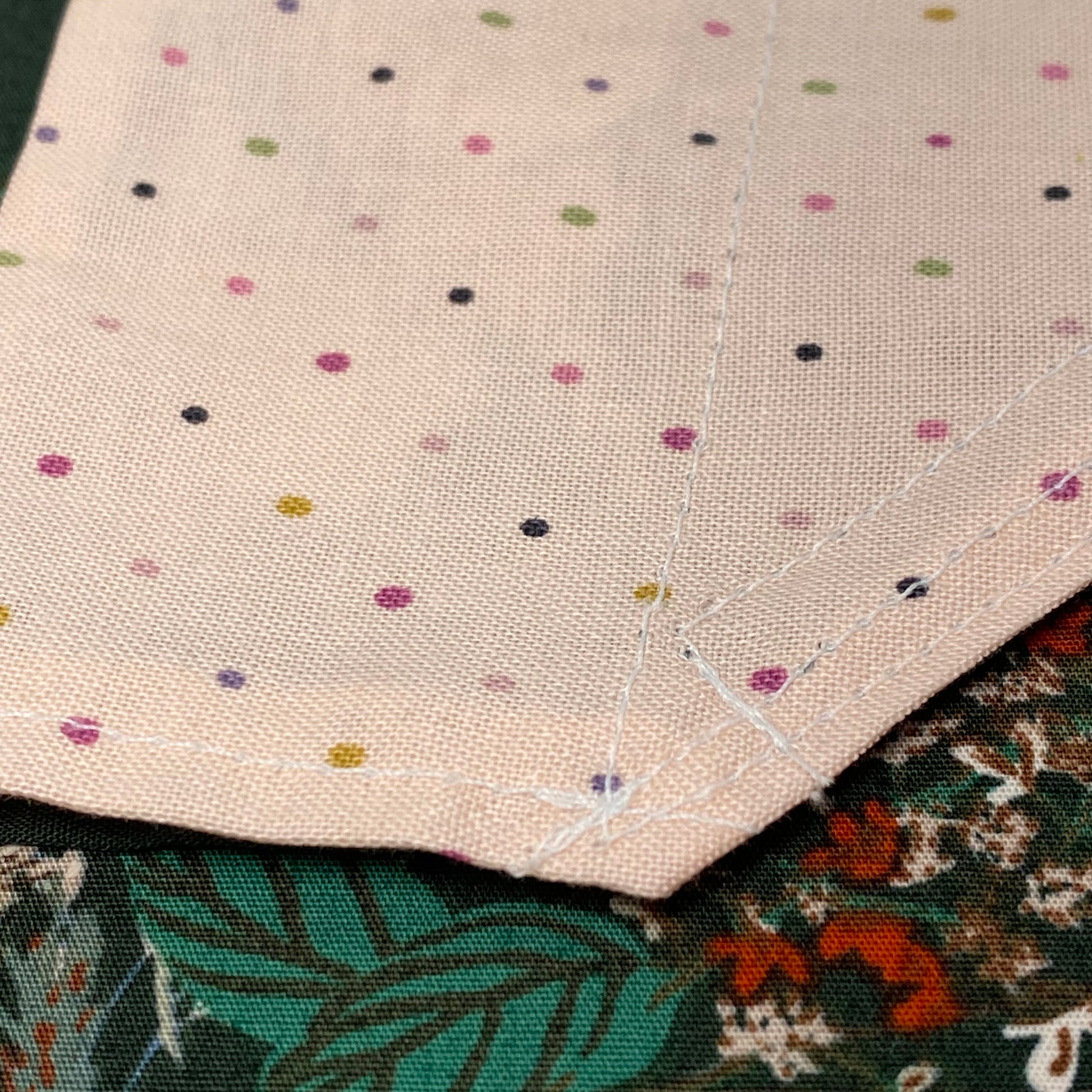 Blush pink dot dog bandana, reverse side of meadow bandana.