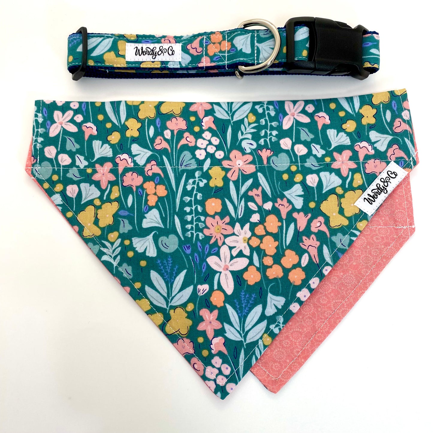 Pastel floral dog bandana that’s reversible and slides over the collar.