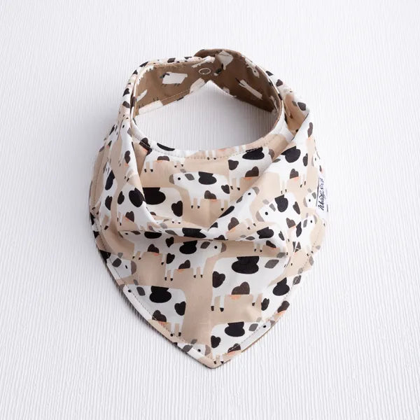 Legend-Dairy cow print reversible baby bib.