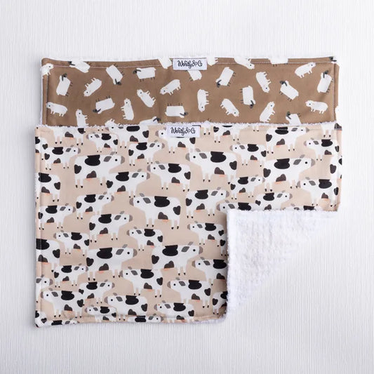 Handmade burp cloths in cow and sheep farm print.