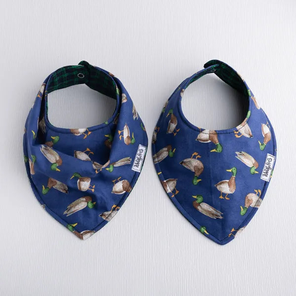 Side by side bandana style and smooth front bibs.