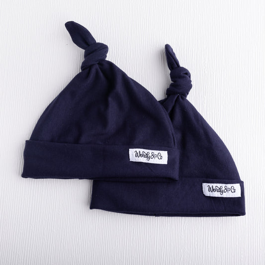 Navy infant beanie.