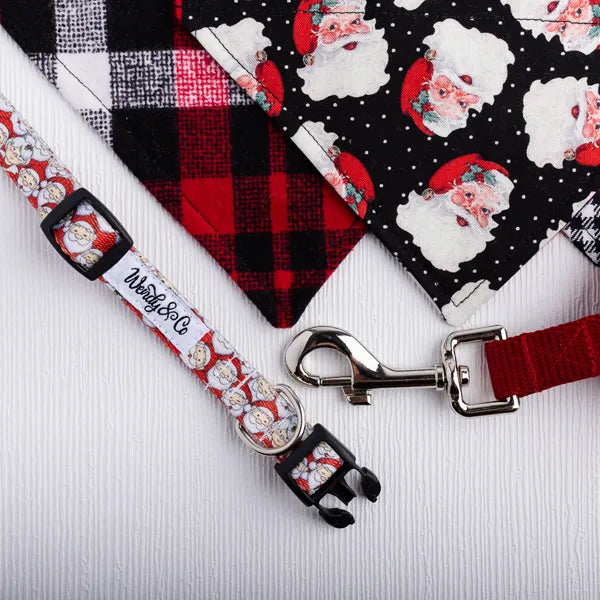 Christmas dog set with Santa head collar, leash, and reversible bandanas.