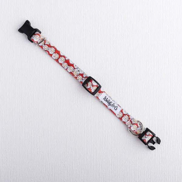 Dog collar with festive Santa head print for Christmas.
