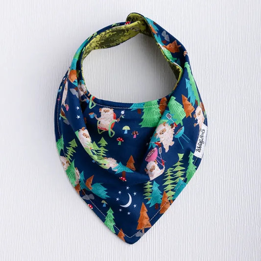 Reversible Big Foot baby bib featuring forest and Bigfoot design.