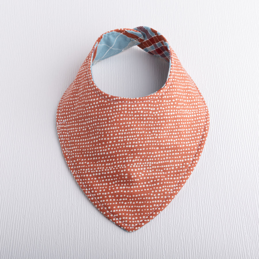 Rust dot baby bib.