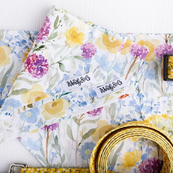 Close up of buttercup floral dog set.