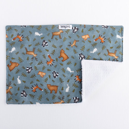 Burp cloth for baby in forest animal theme.