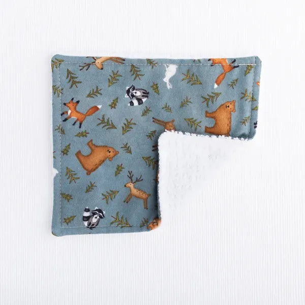Sustainable reusable baby washing cloth in forest print.