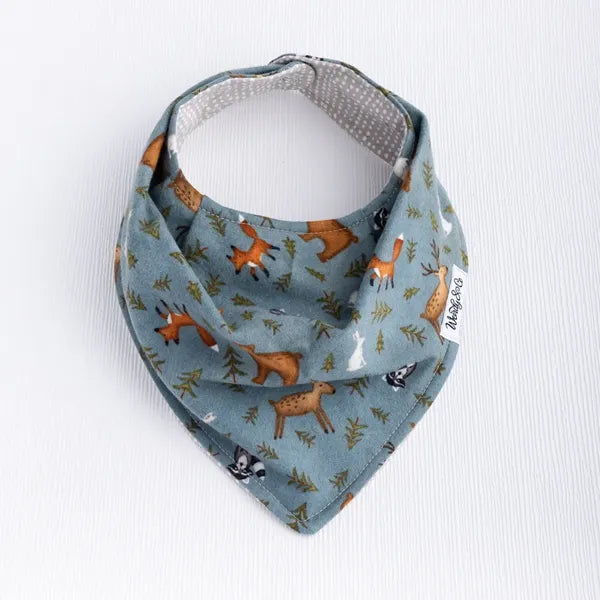 Baby bib with forest-inspired print from the Whispering Woods collection.