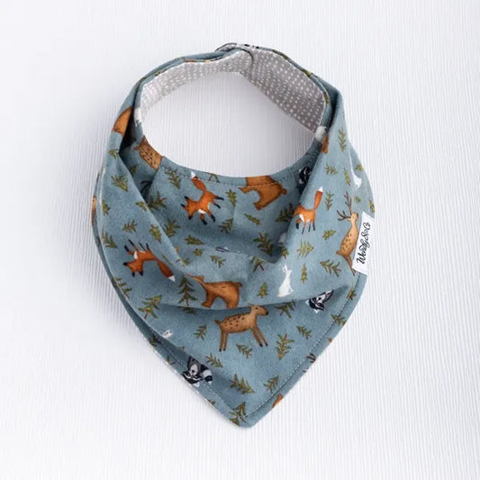 Baby bib with forest-inspired print from the Whispering Woods collection.