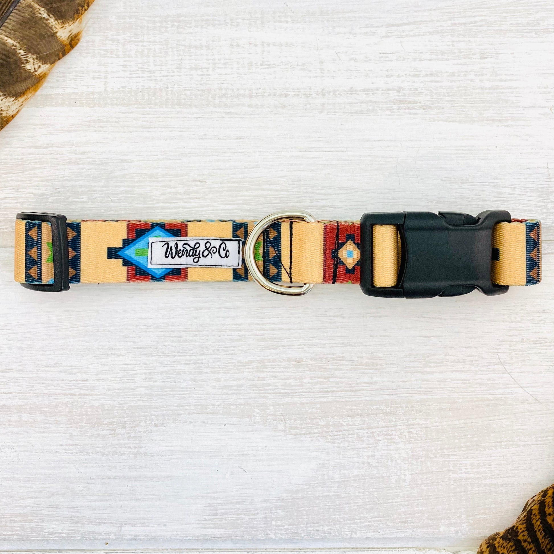 Boho dog collar in brown, rust, blue and black.