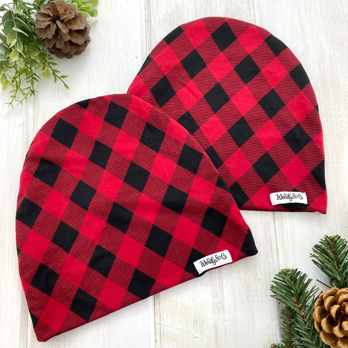 Modern fit slouchy beanie in red and black plaid.
