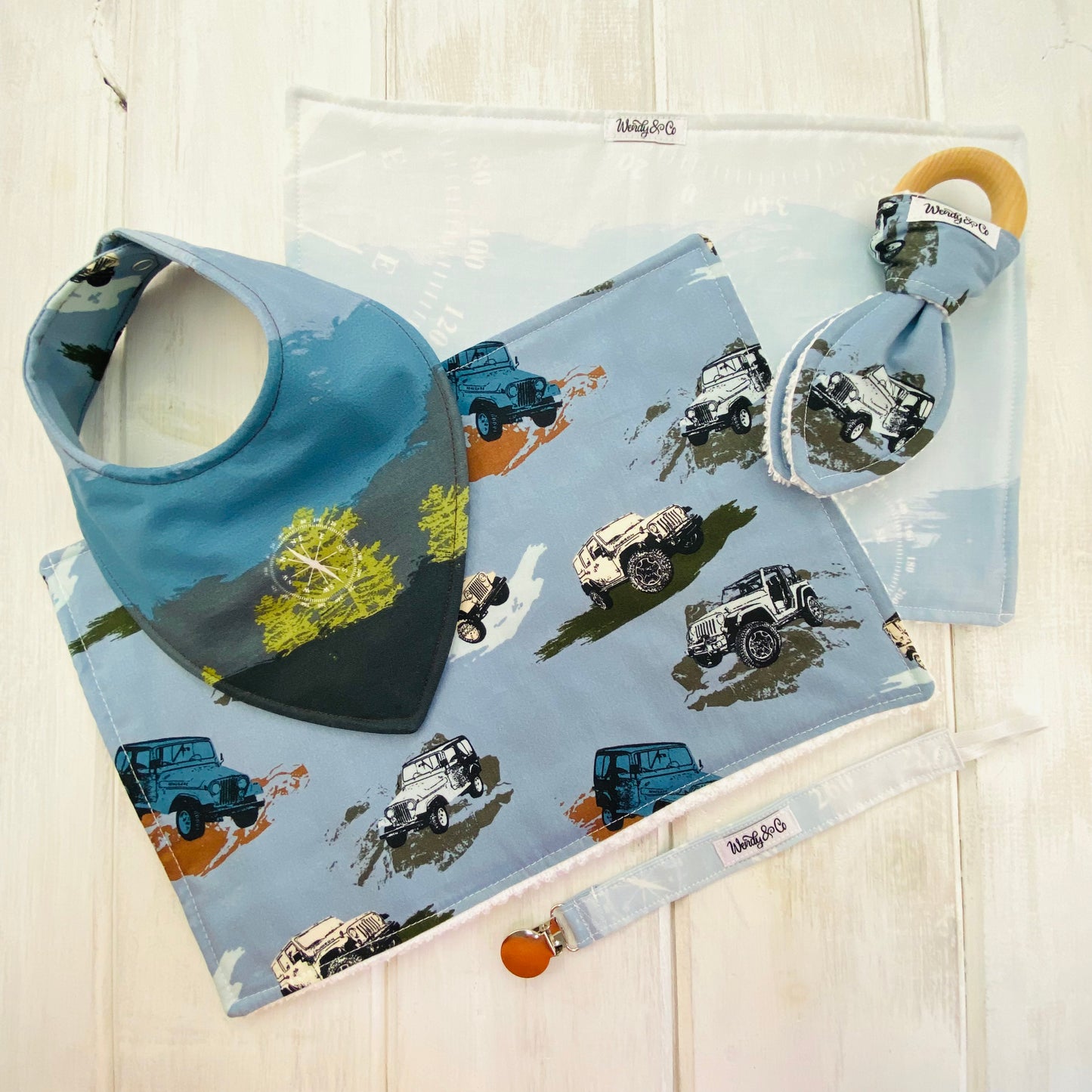 Jeep lovers baby gift set with bib, burp cloth, teether and paci clip.
