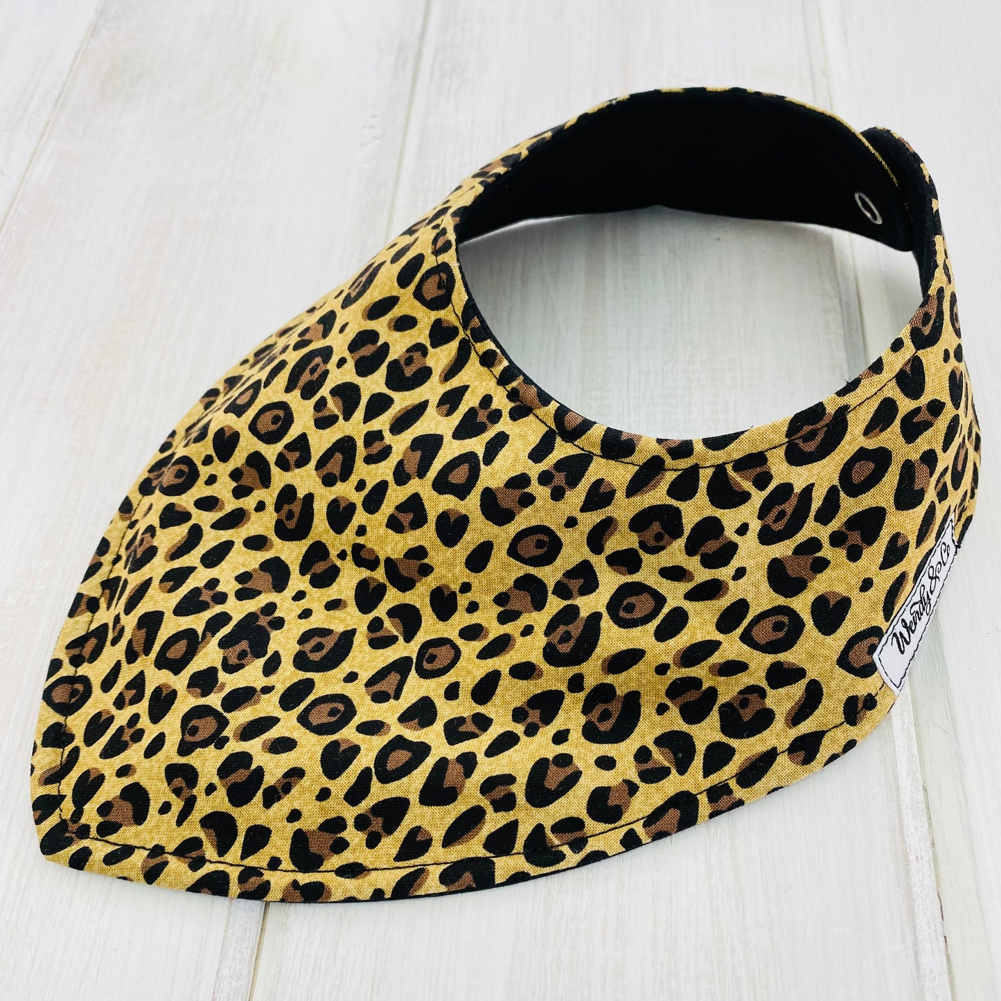 Brown classic cheetah print, animal print, reversible bandana bib for girls.