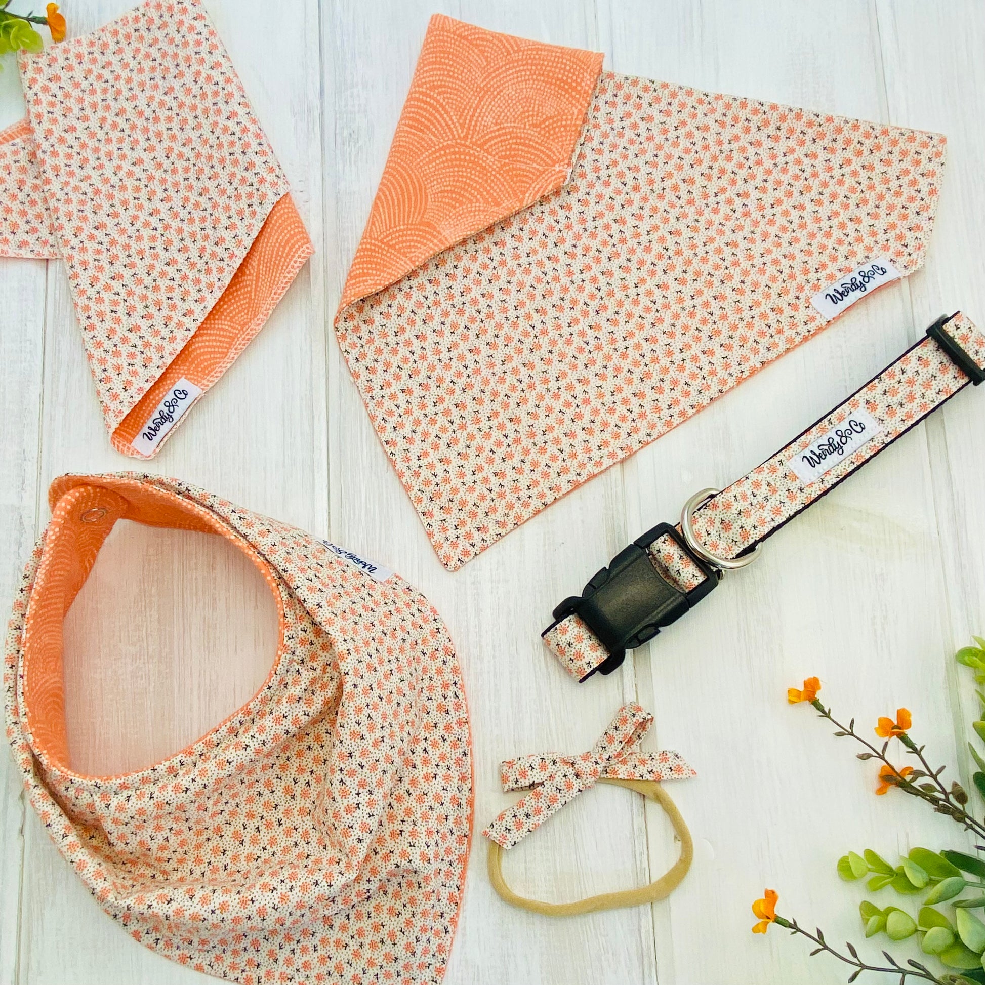 Boho coral floral in baby and dog accessories.