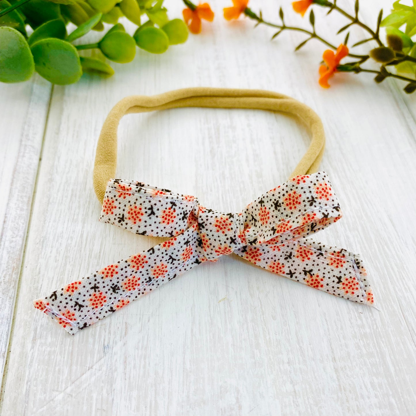 Coral Ditsy Baby Bow