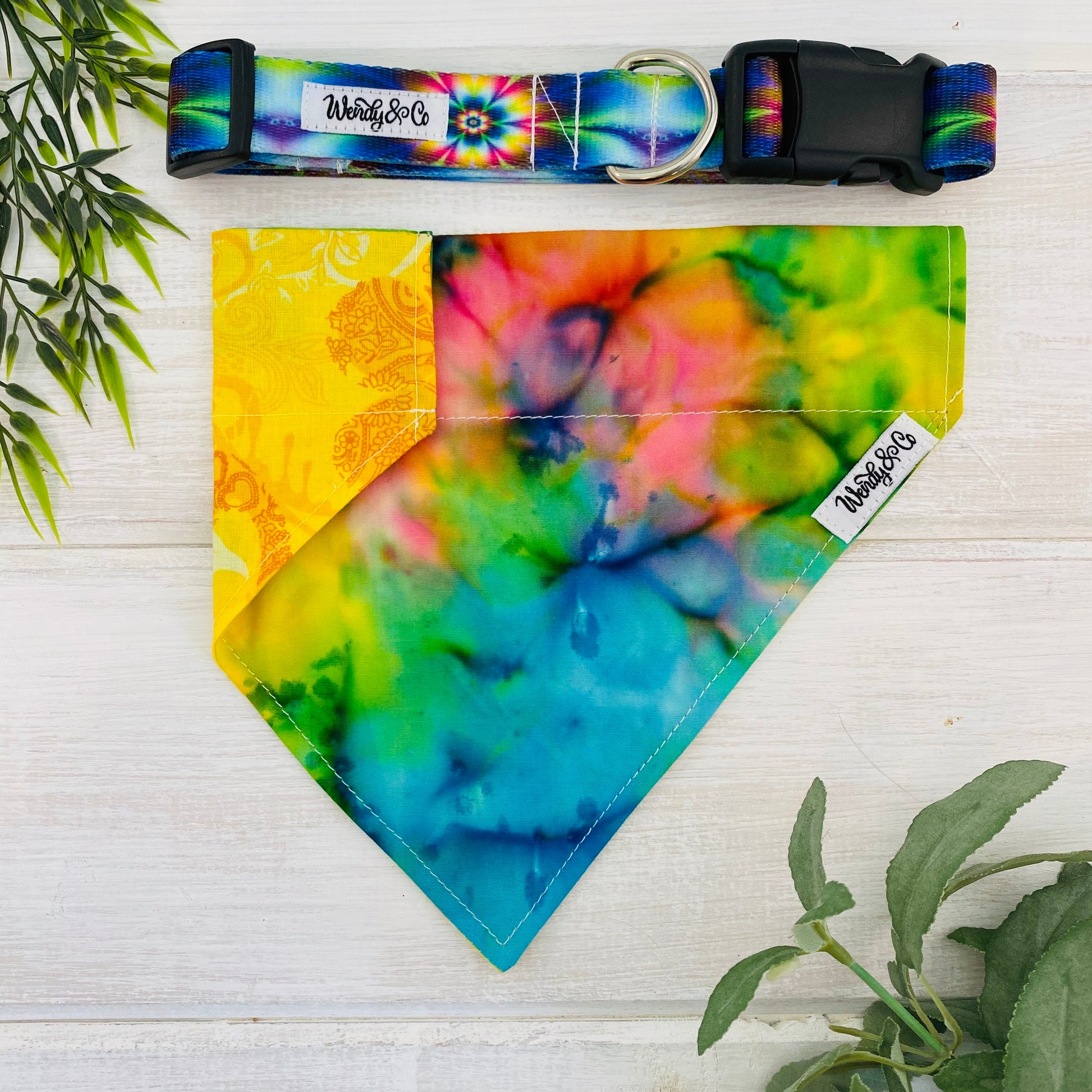 Tie dye dog collar with floral print and matching dog bandana.