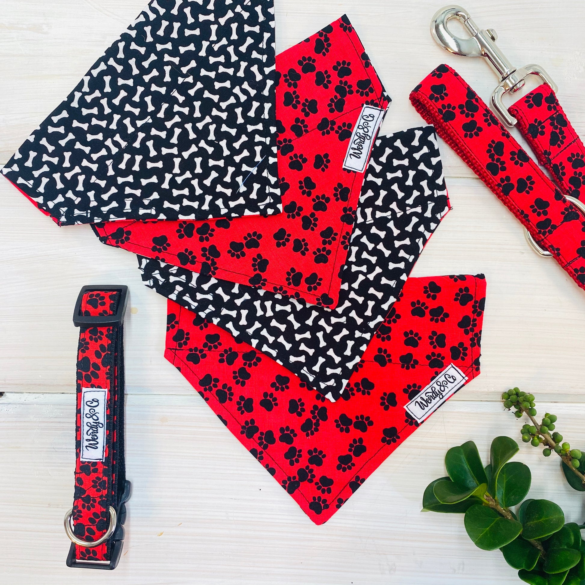 Striking red with black paws bandana and collar for all dog types.